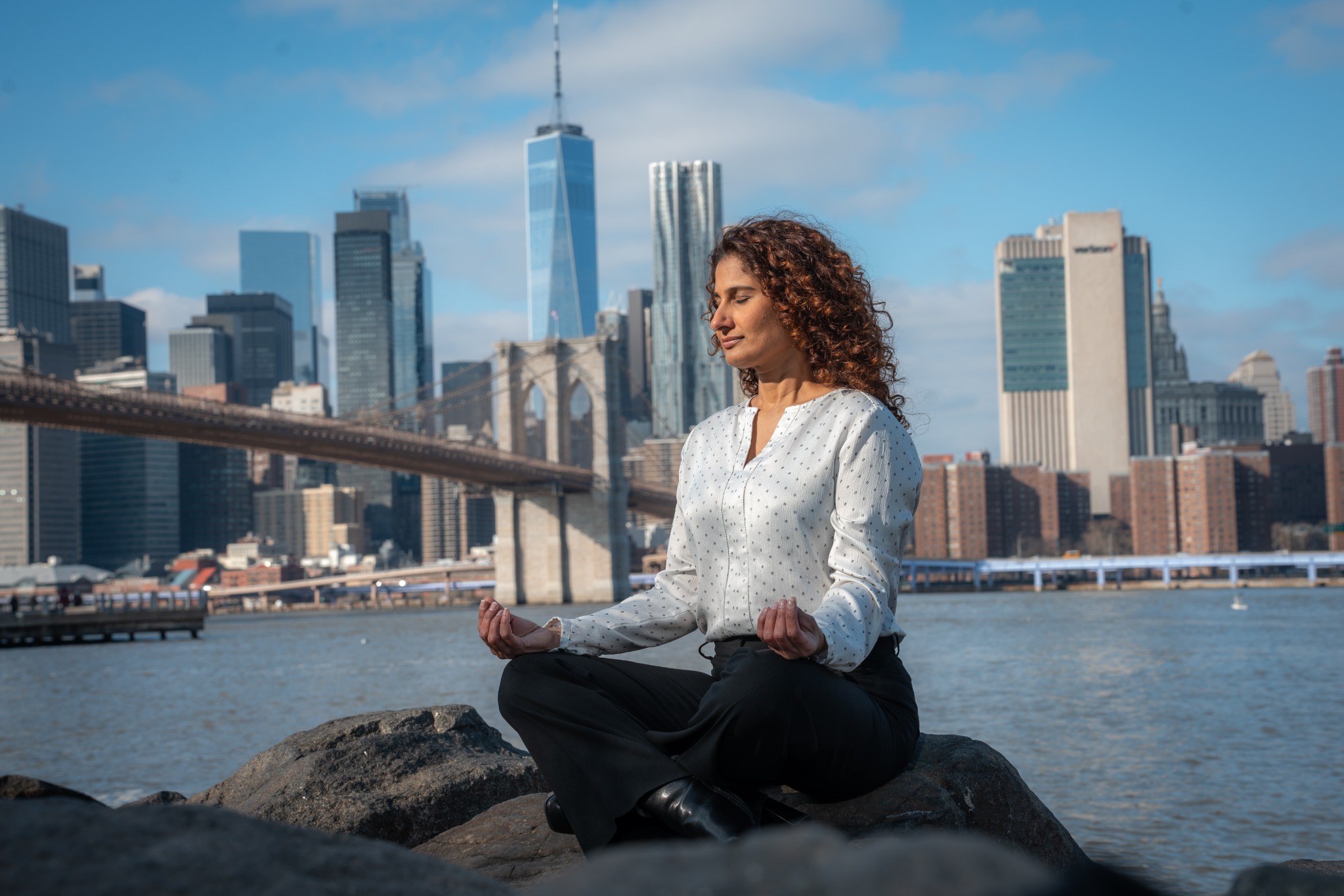 Diane Bacchus practicing MindFitness by the Brooklyn Bridge
